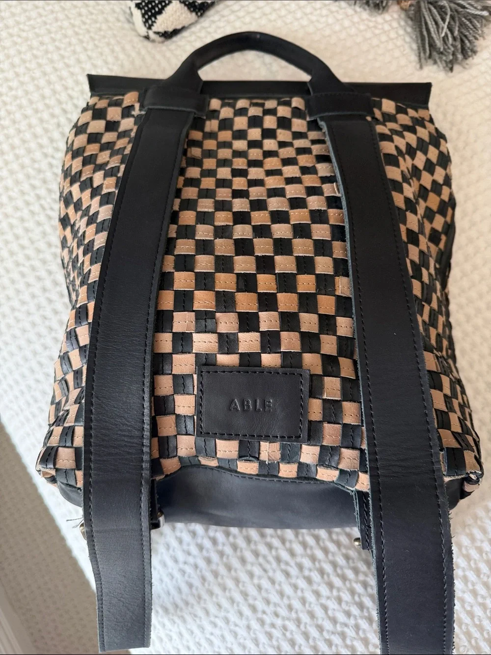 Able Black and Beige Woven Leather Backpack